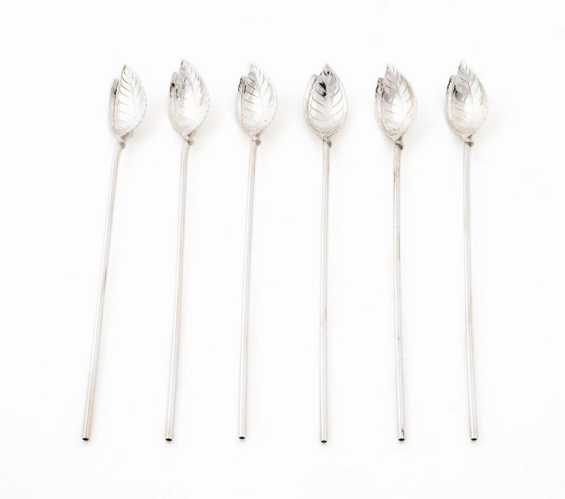 6 TIFFANY & CO. STERLING SILVER MINT JULEP SPOONS: Tiffany & Co., 20th century. Set of six sterling silver leaf motif mint julep spoons incorporating straw handle. Maker's mark and .925 to back. Approx. l. 8.5". Approx. total weight 2.3 ozt.