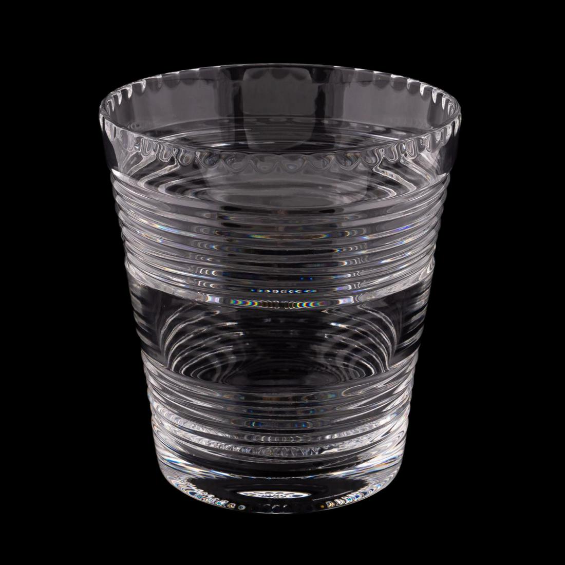 WILLIAM YEOWARD CRYSTAL "ATALANTA" ICE BUCKET: William Yeoward, contemporary. Colorless leaded crystal "Atalanta" ice bucket having a chipped ice patterned rim and two concentric bands to the body. Acid marked to the underside. Approx. h. 6.5", di