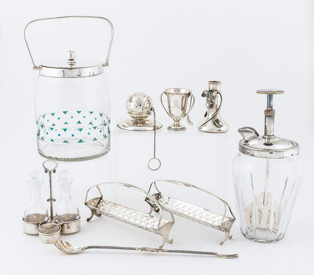 GROUP OF AMERICAN & ENGLISH SILVER ARTICLES: American and English, 20th century. Group of miscellaneous sterling silver and silver plate tableware and serving ware. Comprising of two sterling sugar cube racks, one sterling tea ball with stand, o