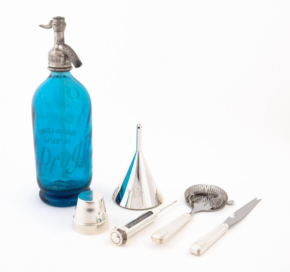 SEVEN PIECE GROUPING OF BARWARE INCLUDING TIFFANY: American, 20th and 21st century. A seven piece grouping of barware including an early 20th century Progreso seltzer bottle, a Gorham sterling silver martini spike, a Tiffany sterling silver jigger, a 