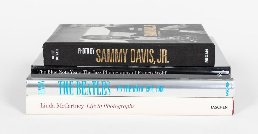 4 ART BOOKS ON FAMOUS MUSICIANS INCL. TASCHEN: Four hardcover coffee table books on famous musicians and bands including "The Beatles On The Road 1964-1966" published by Taschen, "Sammy Davis, Jr." published by Regan, "The Blue Note Years, The Jaz