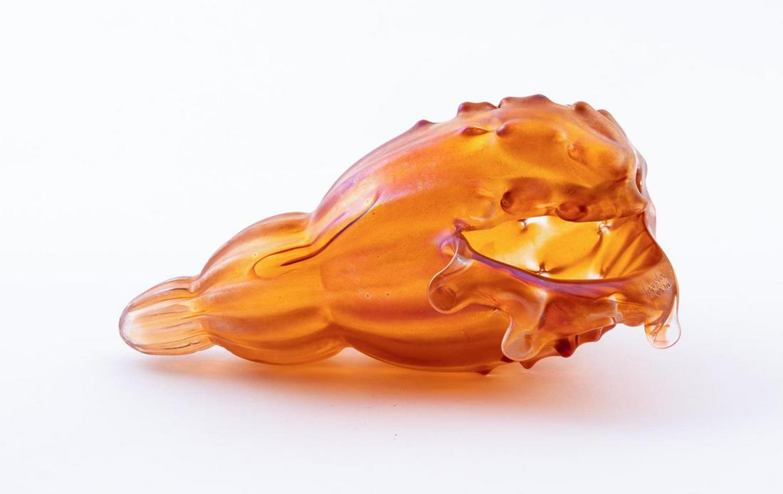 SEGUSO VIRO MURANO IRIDESCENT GLASS SEA SHELL: Seguso Viro Co. (Italian), contemporary. One murano blown glass iridescent orange "conchiglie" sea shell. Etched maker's mark on side. Approx. h. 8.25", w. 4".