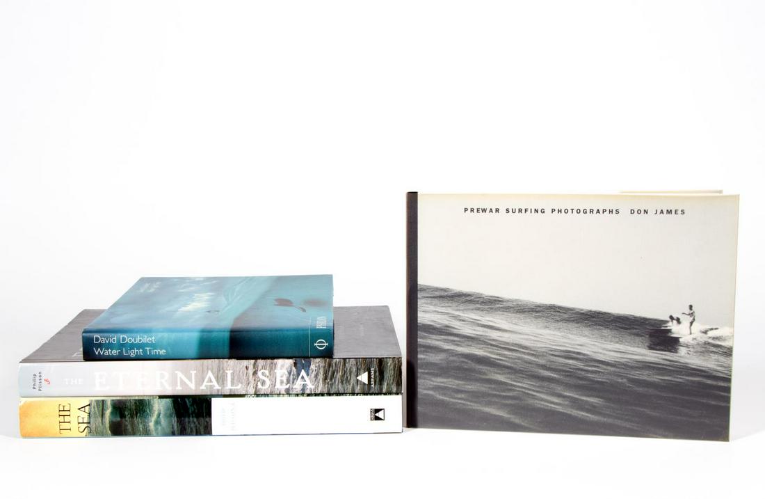 4 HARDCOVER ART BOOKS ON THE SEA & SEA LIFE: A grouping of four hardcover coffee table art books on the sea and sea life including "Prewar Surfing Photographs" by Don James, David Doubilet "Water Light Time" published by Phaidon, "The Sea" with 