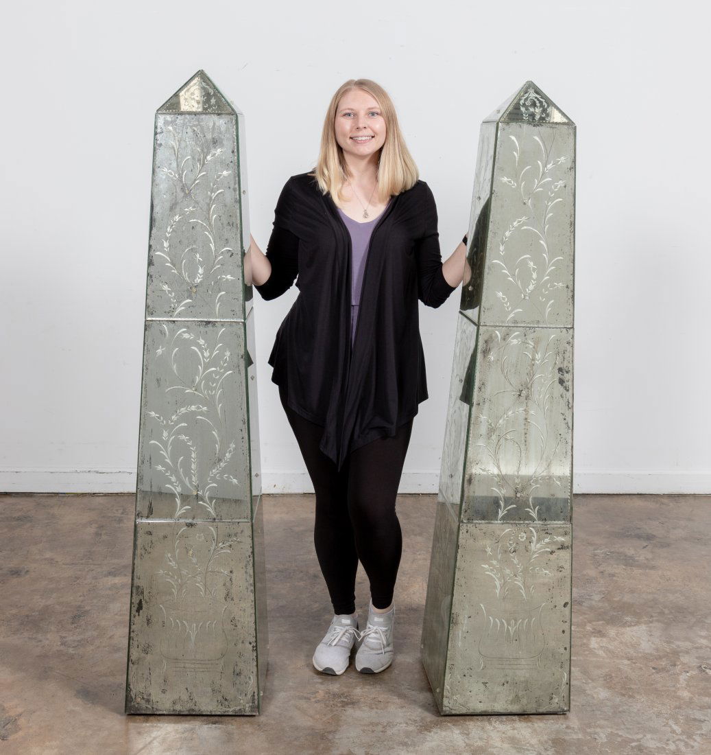 PR., LARGE SCALE VENETIAN STYLE MIRRORED OBELISKS: 20th century. Pair of large scale standing floor obelisks having antiqued mirrored panels with chipped ice edge, and floral urn design. Unmarked, Approx. of one, h. 67.5", sq. 14".