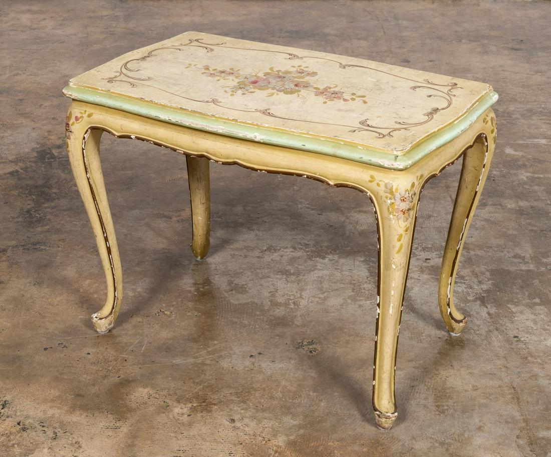 E. 20TH C. FRENCH PAINTED SMALL TEA TABLE: French, early 20th century. Small rectangular form wooden tea table in the rococo taste, having a distressed floral polychrome painted treatment and rising on cabriole legs. Unmarked. Provenance: Acqu