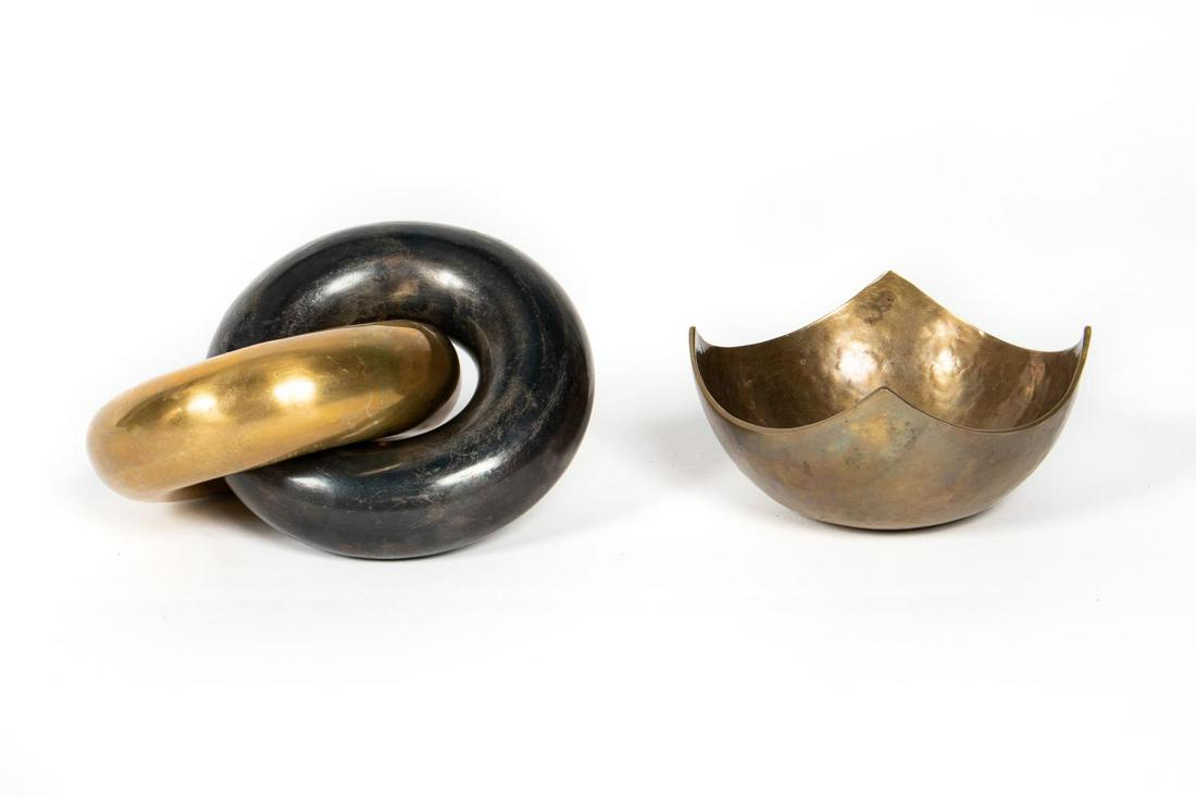 KELLY WEARSTLER "DOUBLE CHAIN" & BOWL: Kelly Wearstler, contemporary. A group of brass table accessories comprising of one "Double Chain" sculpture and one hammered motif bowl. Designer maker's mark to underside. Approx. h. 3", w. 5.625",