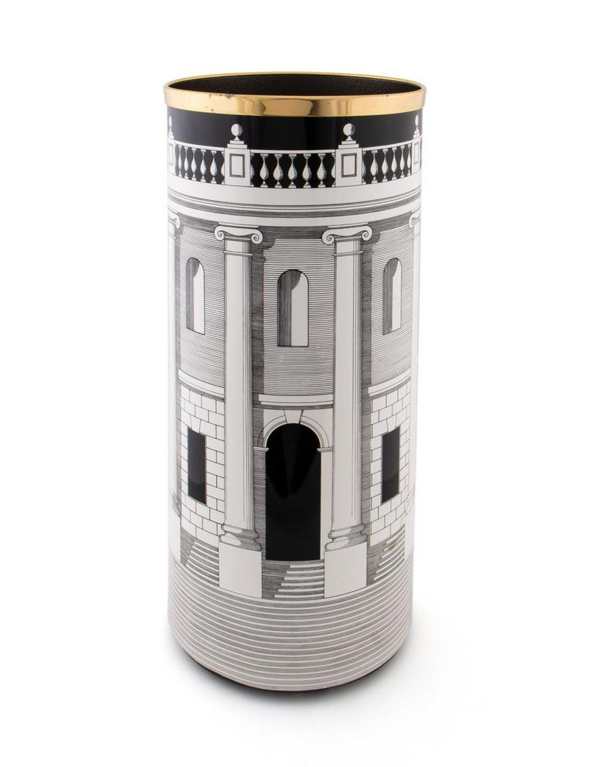 FORNASETTI "HOUSE WITH COLUMNS" UMBRELLA STAND: Fornasetti (Italian, founded 1970), contemporary. Circular "Casa Con Colonne" or "House With Columns" metal umbrella stand having a hand-colored printed image of a classical facade. Marked to the side