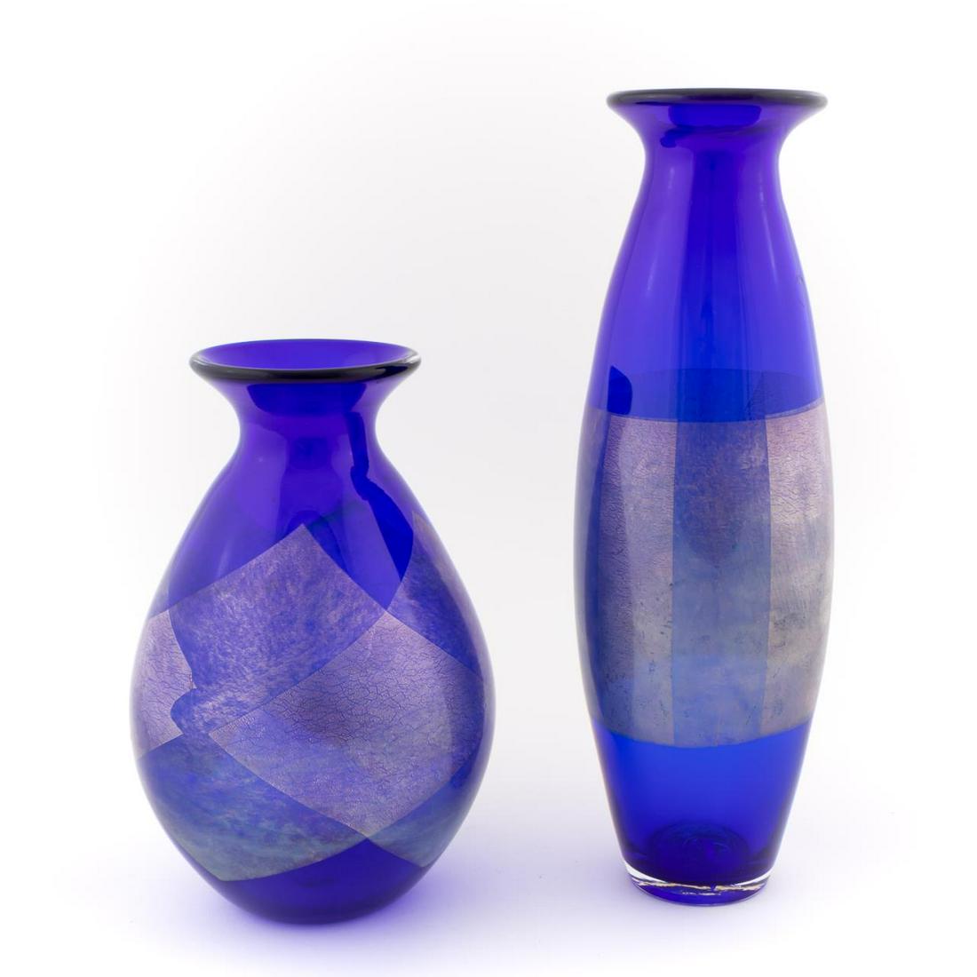 2 JEFF ZIMMERMAN FOR TIFFANY BLUE & SILVER VASES: Jeff Zimmerman (American, b. 1968 -) for Tiffany & Co., contemporary. Two art glass blue and silver accent vases having flared rims. Etched signature and maker's mark to underside. Approx. h. 13" (tal