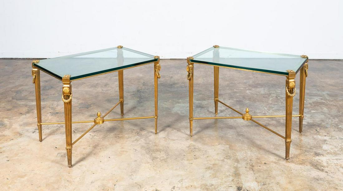 PAIR, GILT BRONZE NEOCLASSICAL STYLE SIDE TABLES: Italian, 20th century. Pair of neoclassical style side / cocktail tables with square fluted column legs and wreath and rosette motif. Apparently unmarked. Approx. h. 26.25", w. 33.75", d. 23.75".
