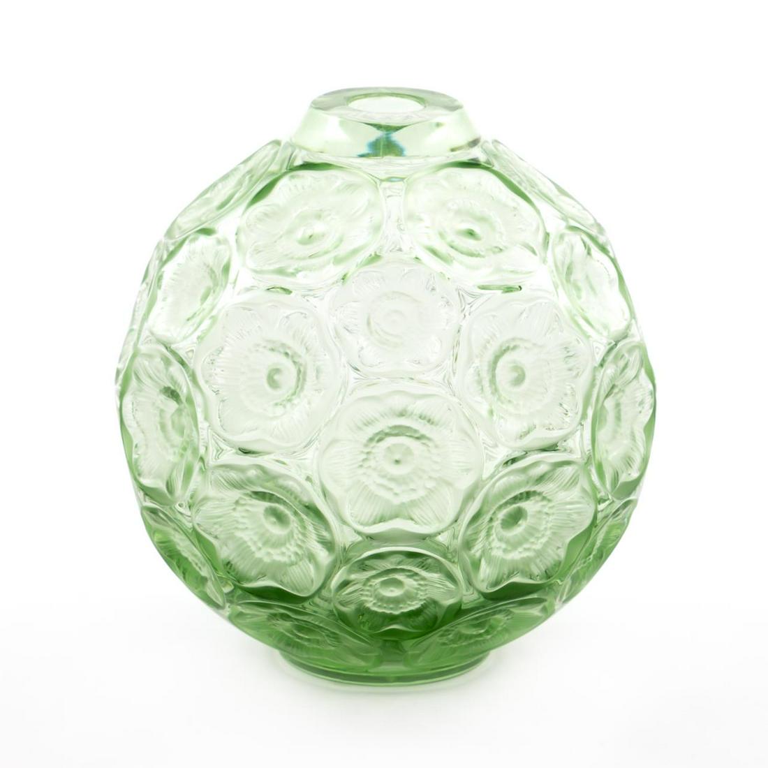 LALIQUE ANEMONES BUD VASE, FROSTED GREEN GLASS: Lalique, contemporary. "Anemones" frosted light green crystal bud vase with floral motif. Etched to underside, "Lalique France" and "SJ09". Approx. h. 5.375", w. 5.25".