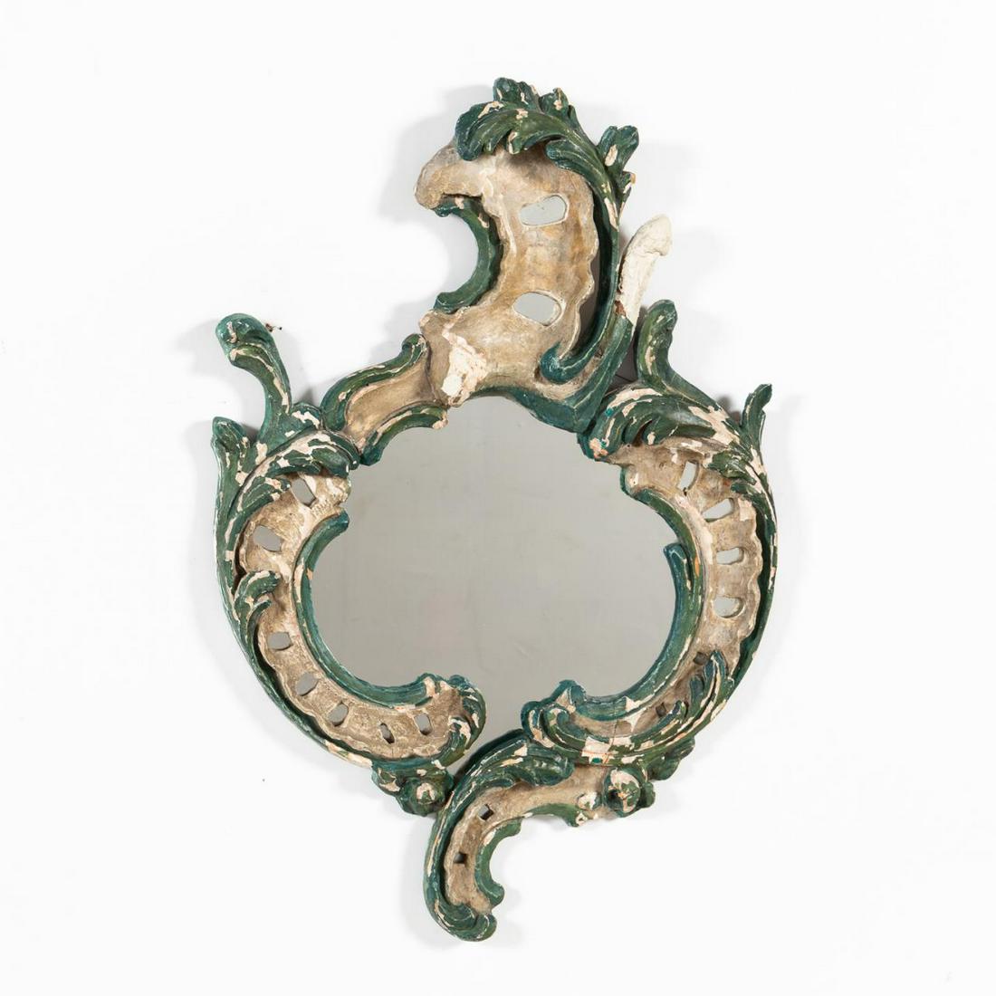 ROCOCO STYLE DISTRESSED POLYCHROME WALL MIRROR: Likely Italian, 20th century. Rococo style distressed polychrome wall mirror with "S" curves. Apparently unmarked. Approx. h. 35", w. 23".