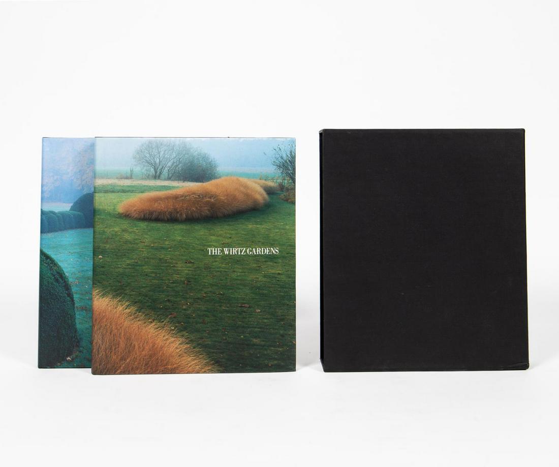 JACQUES WIRTZ GARDENS 2 VOLUME CASED BOOK SET: A hard sleeve two volume set of "Wirtz Gardens" hardcover coffee table books depicting photographs of Jacques Wirtz's famous landscape architecture firm published by Patrick Taylor. The set contains f