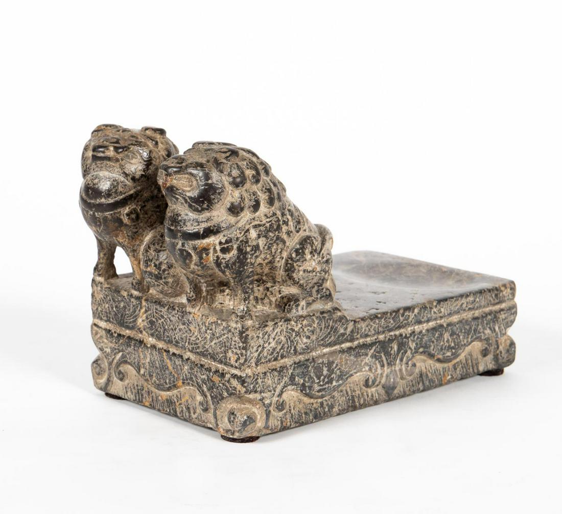 CHINESE HARDSTONE DOUBLE GUARDIAN LION INKWELL: Chinese. Large carved hardstone ink stone with two seated Buddhist lions. Apparently unmarked. Provenance: Acquired from Wing Kuen Ko, owner of KoKo Chinese Antiques, New York, in 2004. Approx. h. 7.5