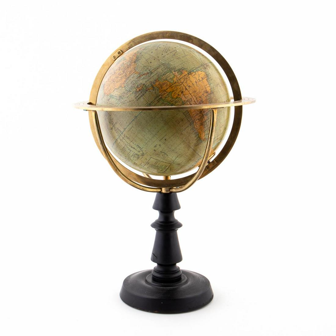 SIGNED FRENCH PAPIER MACHE GLOBE, C.1900: French, circa 1900. A French papier mache terrestrial table globe with brass equatorial table and meridian and resting on an ebonized turned wood pedestal base. Marked for G. Thomas, Editeur Paris. Pr