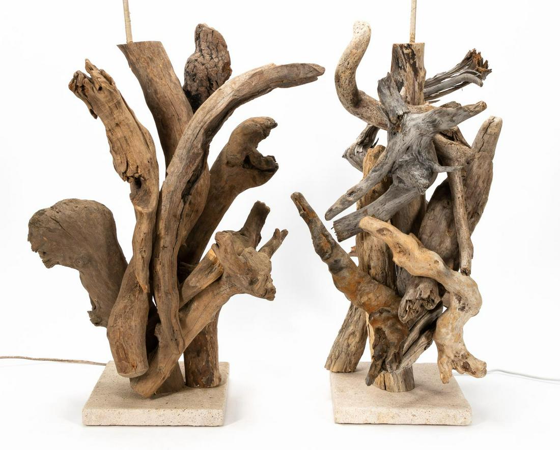 PAIR OF LARGE DRIFTWOOD TABLE LAMPS: Second half 20th century. Pair of substantial drift wood lamps on limestone bases. Apparently unmarked. Approx. h. 33.5" (to socket), w. 19".