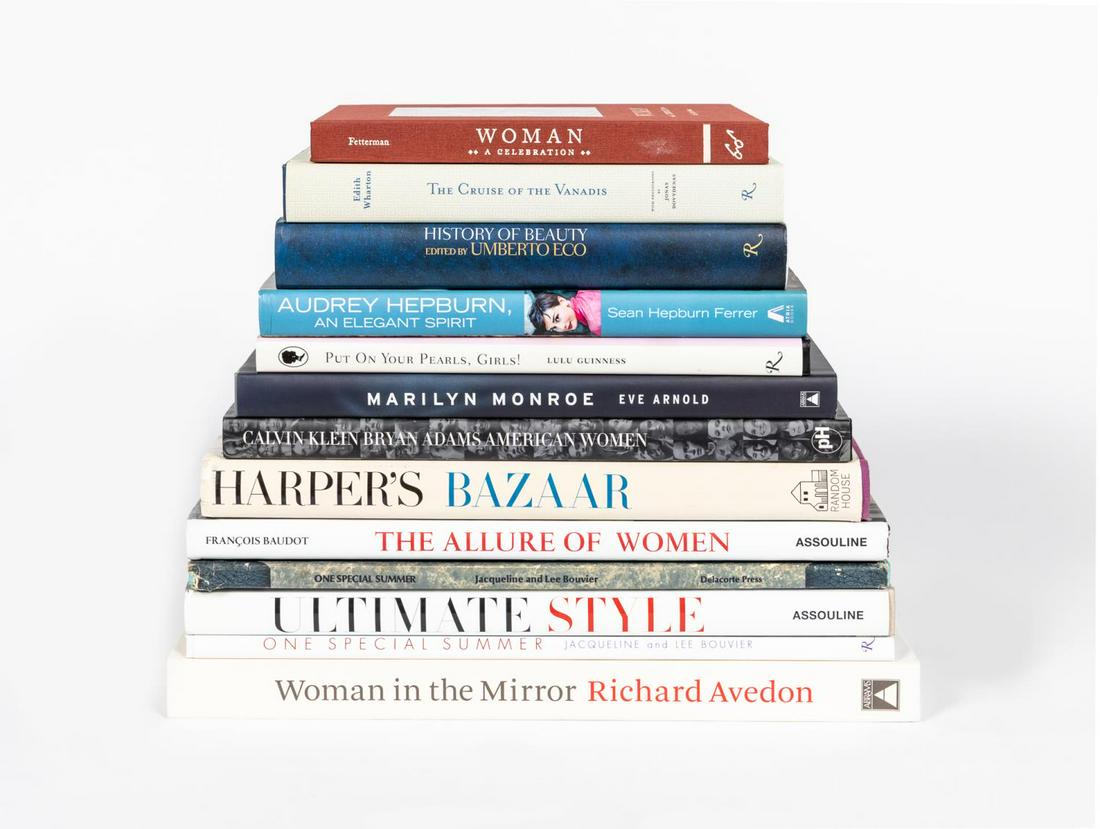 13 ART BOOKS ON WOMEN & STYLE INCL. SIGNED COPIES: A grouping of thirteen hardcover coffee table books on women and their style including "Woman, A Celebration" signed by Peter Fetterman, "History of Beauty" signed by Umberto Eco and published by Rizz