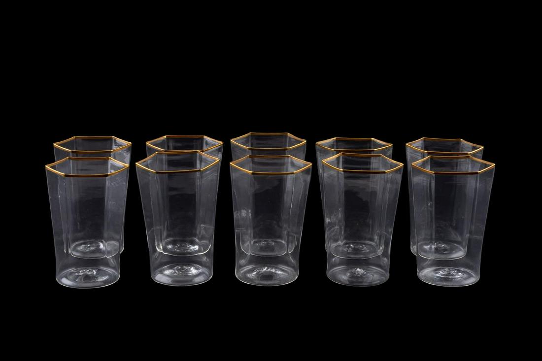 10 SEGUSO COLORLESS DELICATE TUMBLERS, GOLD RIM: Seguso Viro Co. (Italian), contemporary. Set of ten "Esagonali" thin blown glass polygon tumblers / juice glasses having gold rim. Apparently unsigned. Provenance: Purchased from Nina Griscom, New Yor