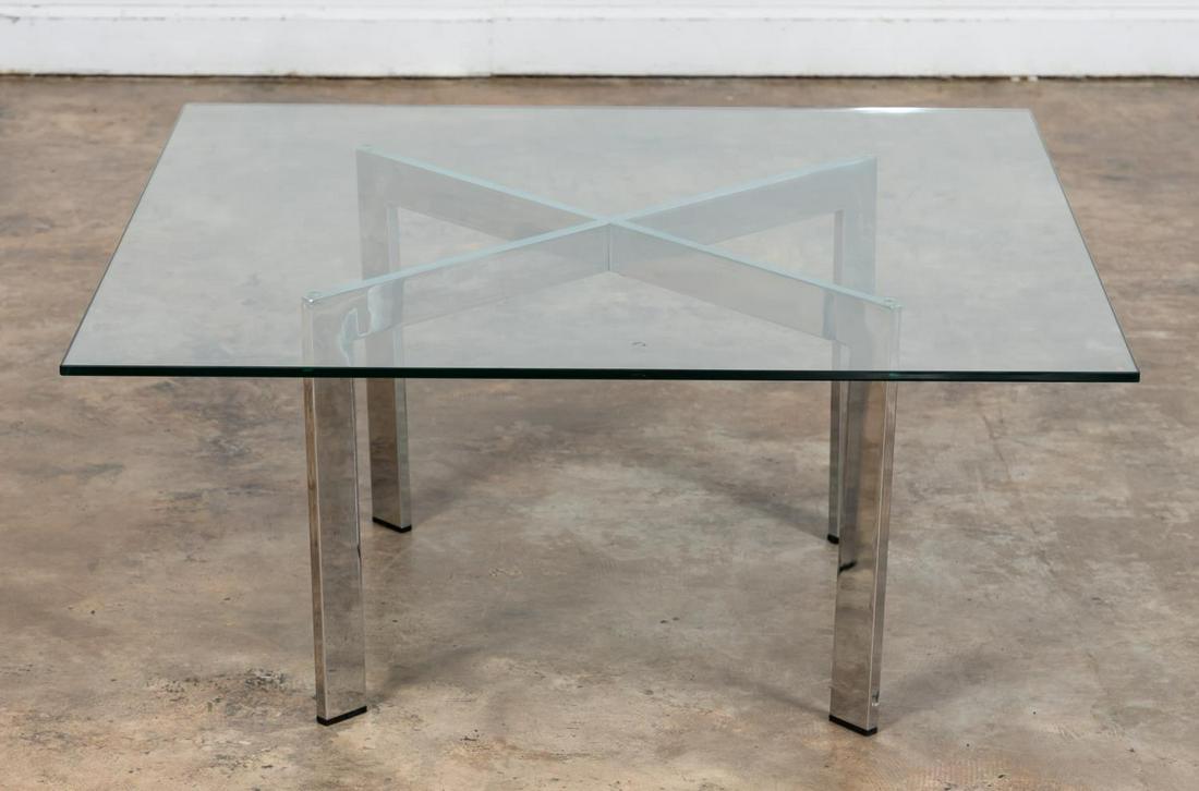 MIES VAN DER ROHE BARCELONA COFFEE TABLE: Ludwig Mies Van Der Rohe (German, 1886-1969) for Knoll Studios (American, founded 1938), mid 1960's. A Mid Century Modern Barcelona table with polished steel "x" form base and square glass top. Appare