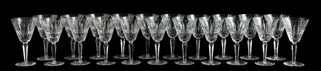 SET, 21 WATERFORD "GLENMORE" WATER GOBLETS: Waterford, contemporary. A set of twenty-one "Glenmore" pattern water goblets. Each marked to foot in gothic script.Approx: h. 7", w. 3.75".