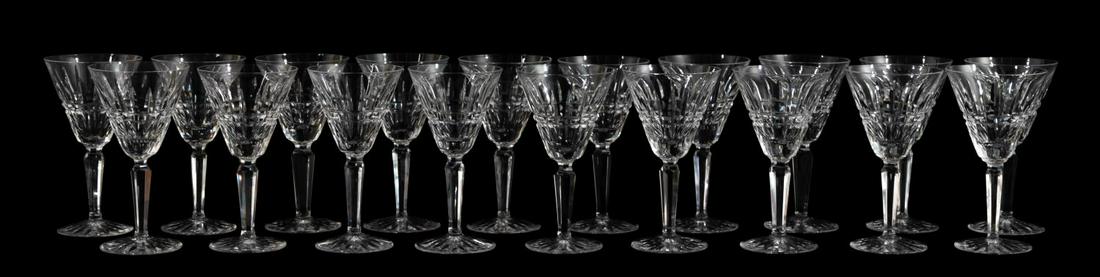 SET, 19 WATERFORD "GLENMORE" CLARET WINE GLASSES: Waterford, contemporary. A grouping of nineteen "Glenmore" claret wine glasses. Each marked to foot with gothic script. Approx: h. 6.5", w. 3.5".Approx: h. 6.5", w. 3.5".