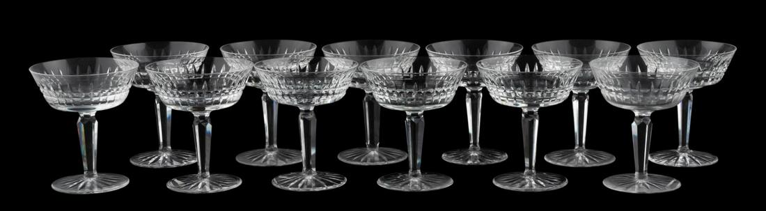 SET, TWELVE WATERFORD "GLENMORE" COUPE GLASSES: Waterford, contemporary. A set of twelve "Glenmore" pattern champagne or sherbet coupe glasses. Each marked to foot with gothic script.Approx: h. 4.75", w. 4".