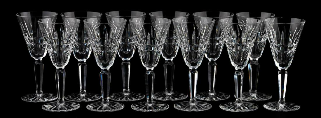 SET, TWELVE WATERFORD "GLENMORE" SHERRY GLASSES: Waterford, contemporary. A grouping of twelve "Glenmore" pattern sherry glasses. Each marked with gothic script to underside.Approx: h. 5.5", w. 2.5" (rim).