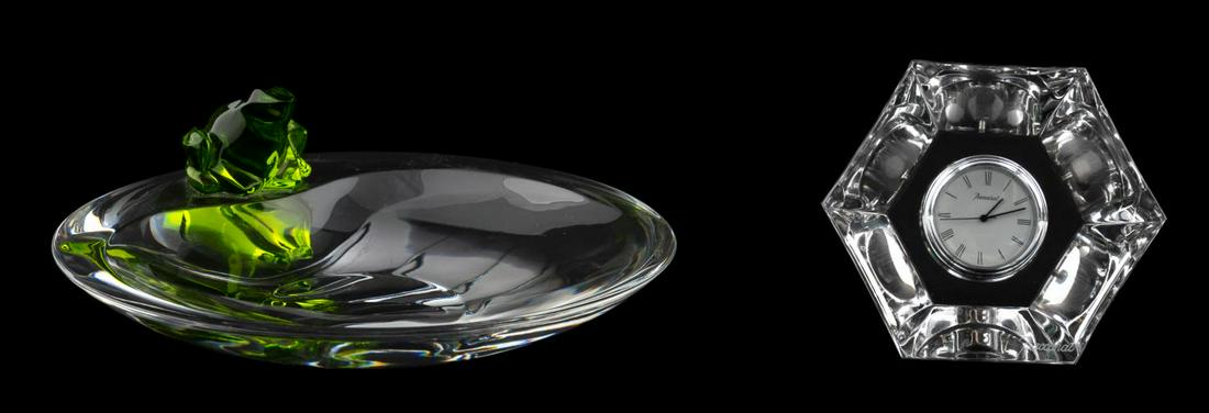 BACCARAT RAINETTE FROG DISH & MALMAISON CLOCK: Baccarat, late 20th century. Two pieces of Baccarat crystal including a crystal frog dish in the "Rainette" pattern and a desk clock in the "Malmaison pattern"; each accompanied with original boxes. E