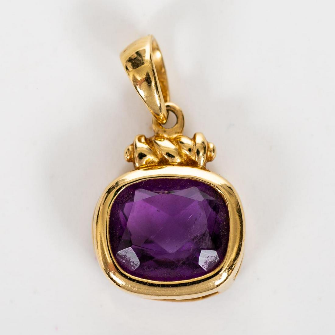 CLYDE DUNEIER, 14K YELLOW GOLD & AMETHYST PENDANT: Clyde Duneier (American, founded 1910). A 14K yellow gold and central mounted amethyst pendant. Marked “CID, 14K” to verso. Approx: h. 0.75”, w. 0.50”; with a total approximate weight of 2 gra