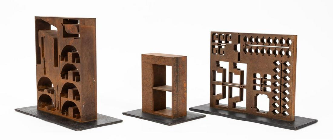 SET OF 3 BRUTALIST STYLE IRON SCULPTURES: 20th/21st century. Group of three Brutalist-style modern iron sculptures, possibly industrial extrusion molds, with natural rust patina on black metal bases. Apparently unsigned. Note: retailed by Ant