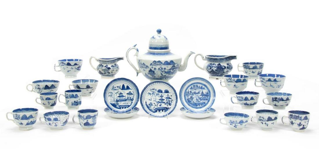 24PC CHINESE EXPORT BLUE & WHITE CANTON PORCELAIN: Chinese. Blue and white Canton porcelain matched tea service comprising of one large teapot (h. 9.75", w. 10.5"), one large creamer (h. 4", W. 6.75"), one medium creamer (h. 3.25", w. 5.25") five sauc