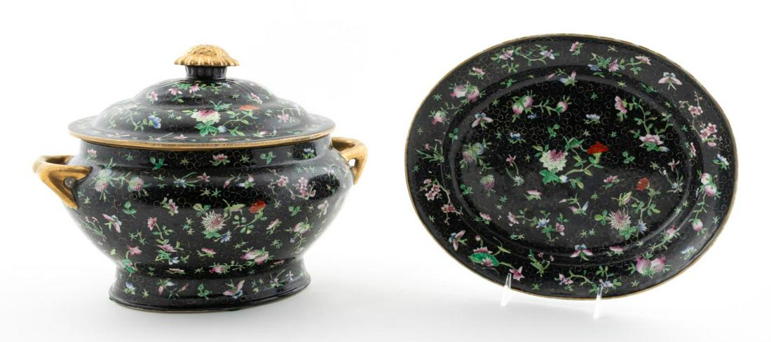 2PC CHINESE FAMILLE NOIR TUREEN & UNDERPLATE: Chinese. Famille noir export porcelain lidded tureen with underplate having floral, berry, and foliate motif. Red character mark to underside, Qianlong style mark.Approx. h. 12", w. 13.5" (handles).