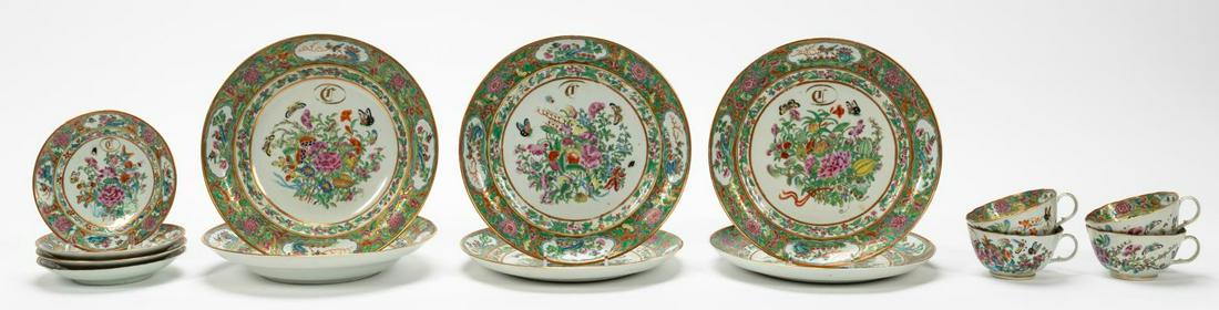 14PC CHINESE EXPORT FAMILE ROSE SET, MONOGRAMS: Chinese. Fourteen pieces of export famille rose porcelain pieces having peony, bird, and foliate motif with gilt accents and gilt monogram. Comprising of four tea cups (h. 2.375"), four saucers (diam.