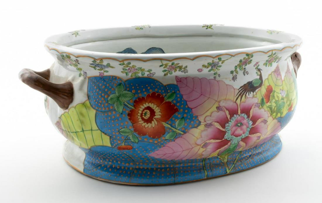 CHINESE EXPORT LARGE TOBACCO LEAF HANDLED BASIN: Chinese. Tobacco Leaf pattern export porcelain handled planter with hand painted floral and fish design to interior. Red four character mark to underside.Approx. h. 8.25", w. 22", d. 13.5".
