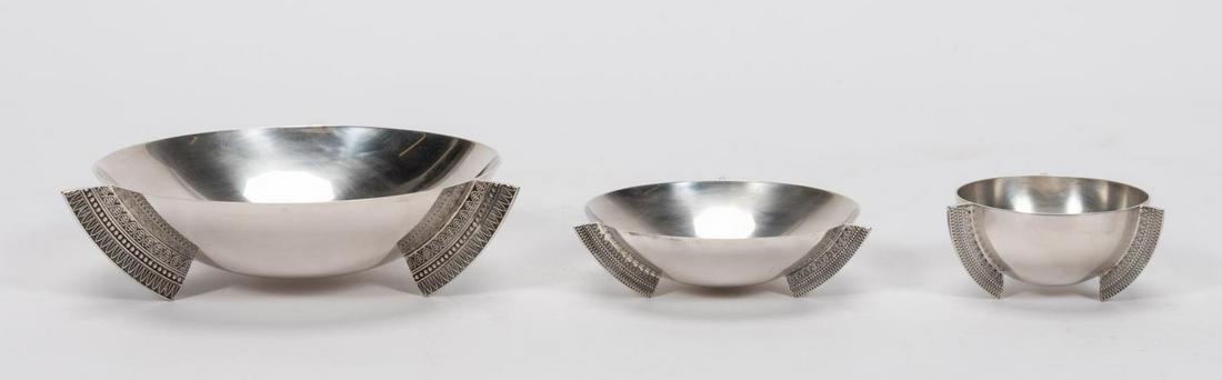 THREE, CHRISTOFLE ART DECO STYLE FOOTED BOWLS: Christofle (French, founded 1830). A three piece grouping of Art Deco style silverplated footed bowls in a pattern similar to "Malmaison". Marked to each "Christofle" with appropriate hallmarks.Approx