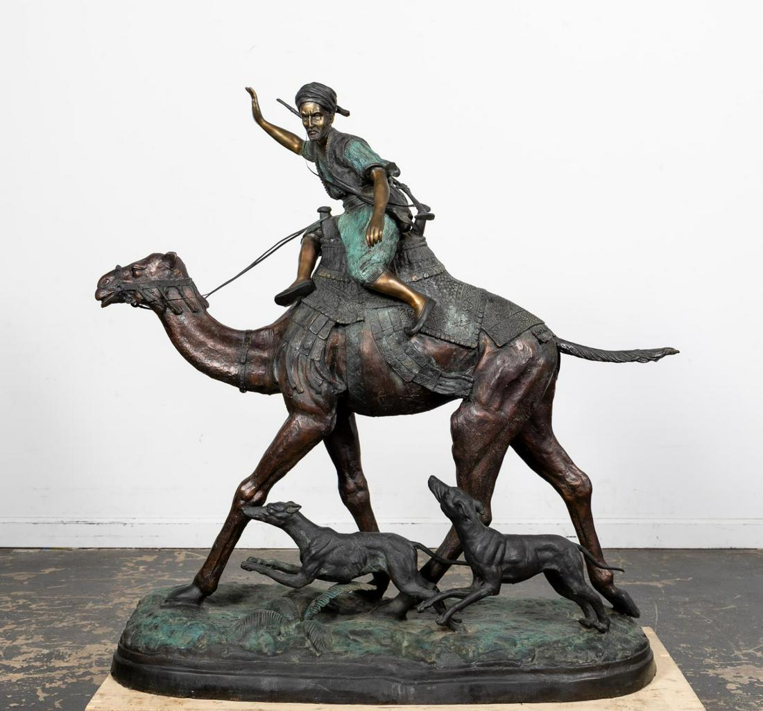 AFTER ALFRED DUBUCAND, LARGE BRONZE CAMEL HUNTER: After Alfred Dubucand (French, 1828 – 1894). "Hunting in the Sahara" - 20th century after the 1875 model, cast and patinated bronze, with spurious signature "PJ Mene" in mold to lower right of base.