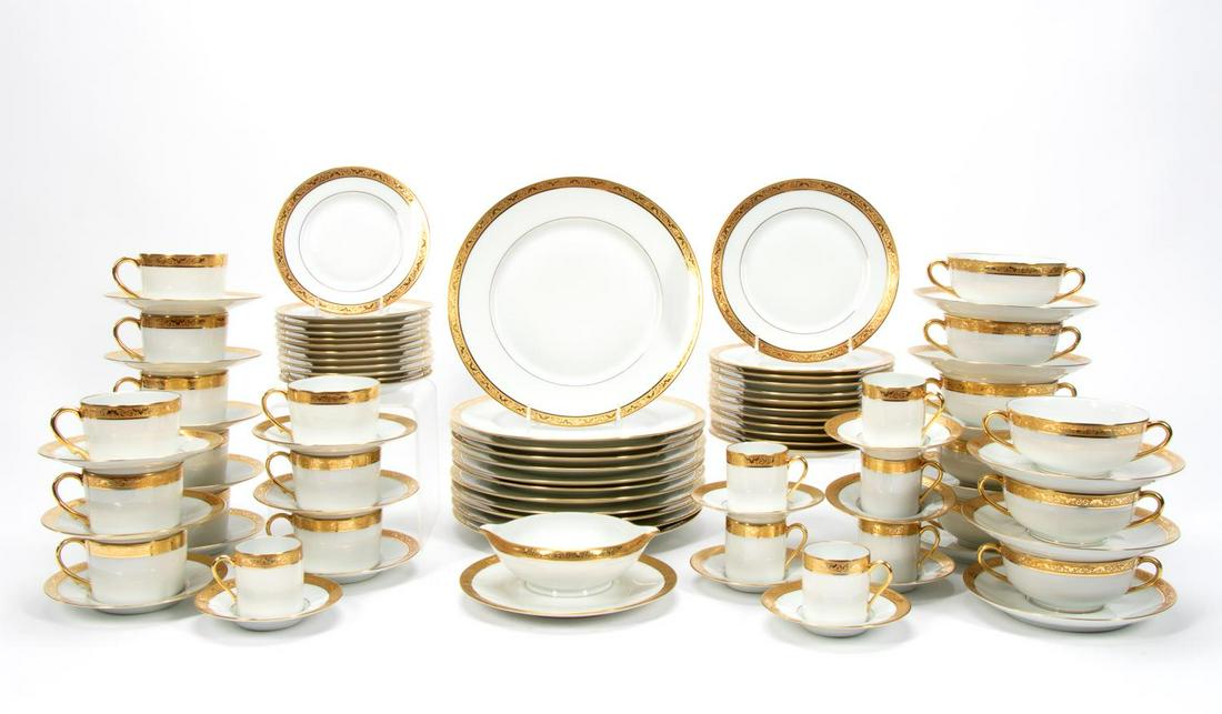 89 PC RAYNAUD LIMOGES "AMBASSADOR GOLD" CHINA SET: A Raynaude et Cie (French), late 20th century. Eighty nine piece porcelain dinner service in "Ambassador Gold" comprising of twelve dinner plates (diam. 10.75), twelve salad plates (diam 7.625"), twel