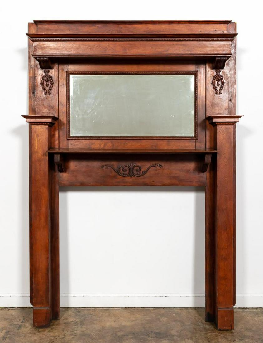 COLONIAL REVIVAL MIRRORBACK FIREPLACE MANTEL: American, late 19th/ early 20th century. Colonial Revival style mahogany stained fireplace mantel surround with inset beveled glass mirror, mantel shelf, and overmantel shelf. Apparently unmarked.Appr