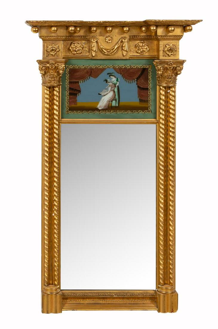 19TH C. FEDERAL EGLOMISE GILT WOOD MIRROR: American, early 19th century. A Federal tabernacle mirror having an architectural cornice with leaves and spherules and a rosette and drapery frieze above a eglomise panel of two female singers on a d
