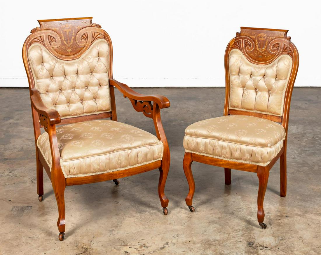 TWO EDWARDIAN MARQUETRY INLAID PARLOR CHAIRS: American, early 20th century. Edwardian style mahogany framed parlor arm and side chair from a larger set, with shaped and carved crest rails having floral marquetry inlay highlighted with mother of p