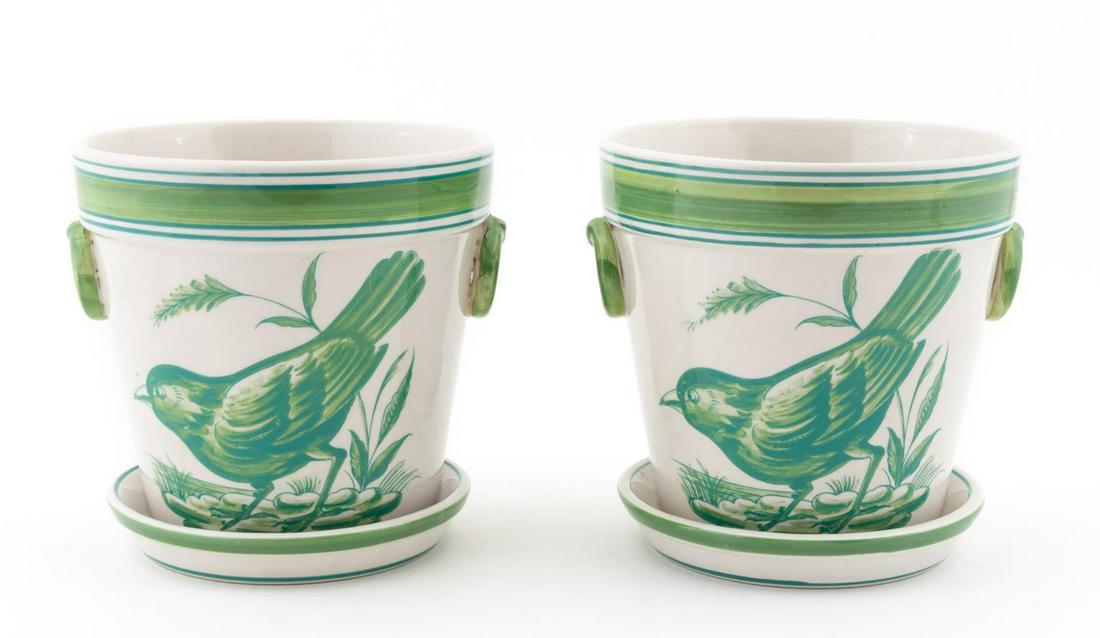 PAIR, MOTTAHEDEH FAIENCE CACHE POTS W/ BIRDS: Mottahedeh, 20th century. A pair of green faience glazed cache pots or planters with under trays having a bird and floral motif decoration. Marked to underside "Hand Painted Portugal, A Mottahedeh Des
