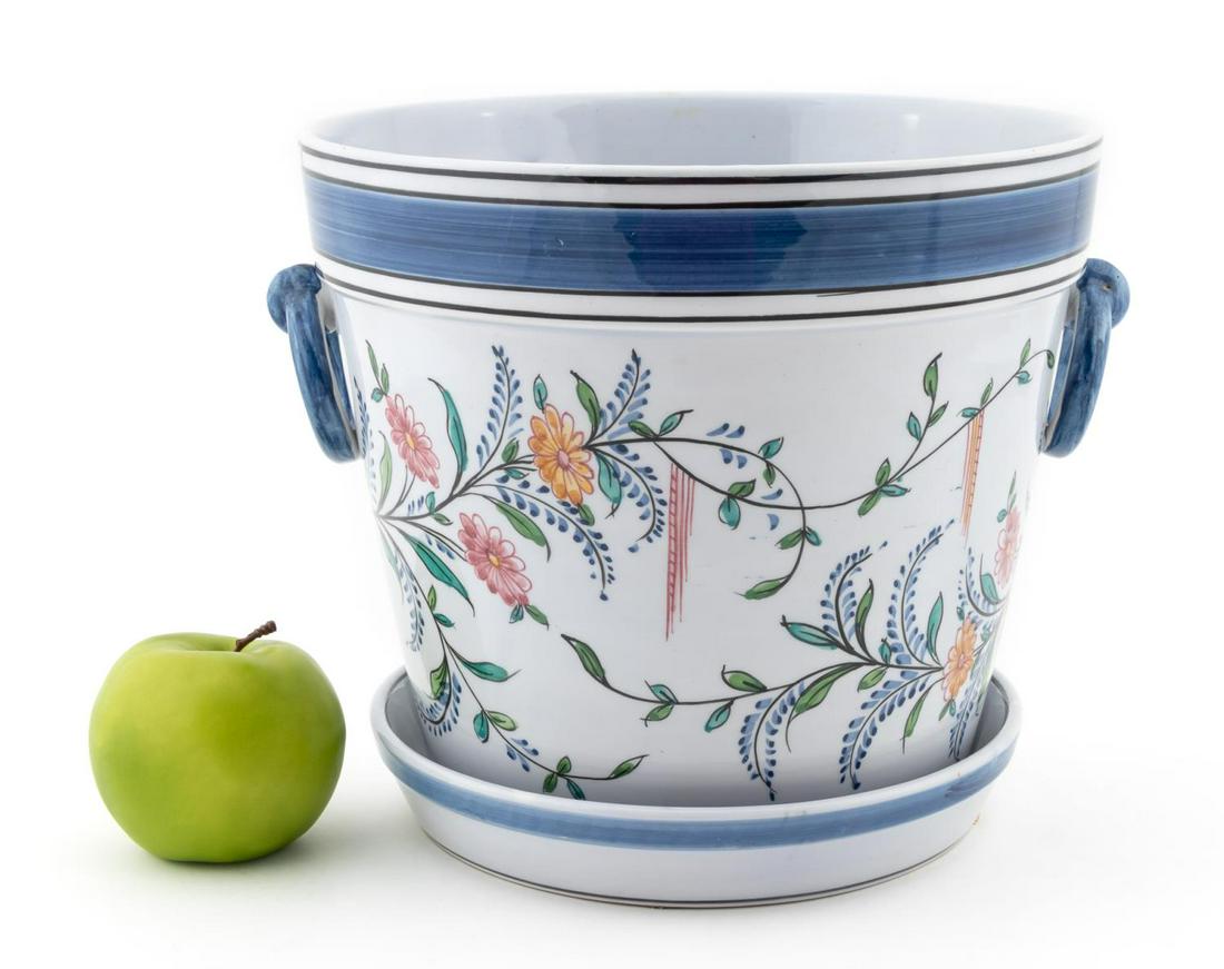 MOTTAHEDEH ORIENTALIST JARDINIERE W/ UNDERPLATE: Mottahedeh, 20th century. A large faience glazed jardiniere or planter with a hand painted Orientalist scene to the body and two faux handles. Marked to underside "Hand Painted Portugal, A Mottahedeh 