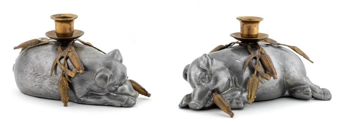 PAIR, MIXED METAL & PEWTER PIG MOTIF CANDLESTICKS: American or Continental, second half 20th century. Pair of mixed metal, pewter and brass decorative pig from candlesticks with ears of corn as accents. Apparently unmarked.Approx. h. 4", w. 7.25".
