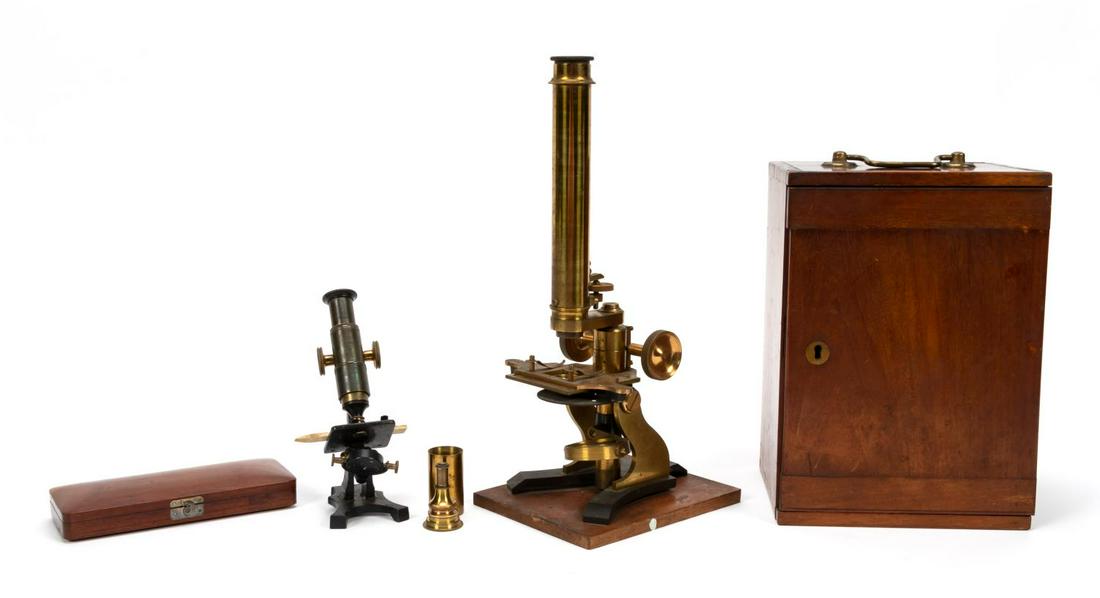 TWO ANTIQUE MICROSCOPES & WOODEN BOX: Grouping of antique medical or scientific instruments comprising a brass and iron microscope in mahogany case with with three accessories inscribed "J. Hicks/London" (possibly James Joseph Hicks (1861