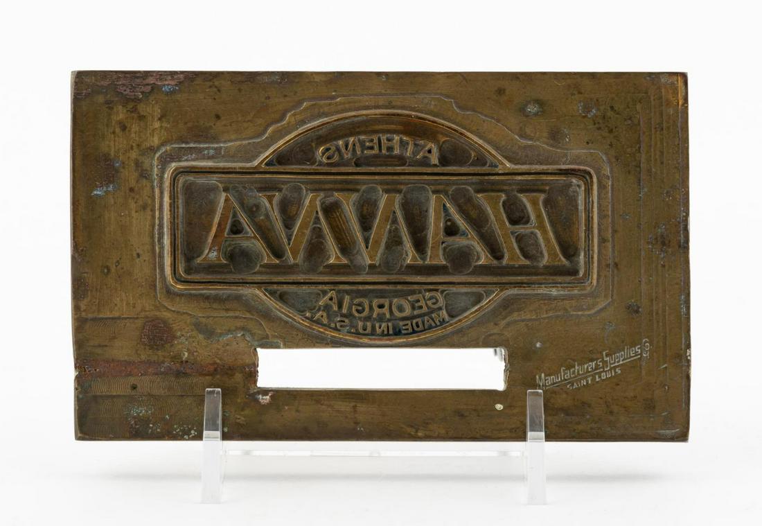 HANNA MANUFACTURING CO. STAMPING LOGO BAT DIE: Hanna Manufacturing Company (American), first half 20th century. Metal stamping logo die plate for baseball bats. Marked to front with "Hanna. Athens, Georgia, Made in U.S.A.". Provenance: Found at si