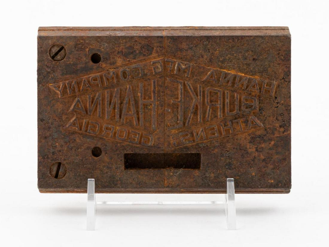 HANNA MANUFACTURING CO. BAT PLATE, BURK-HANNA: Hanna Manufacturing Company (American), first half 20th century. Metal stamping logo die plate for baseball bats. Marked to front with "Burk-Hanna. Athens, Georgia, Made in U.S.A.". Provenance: Found 