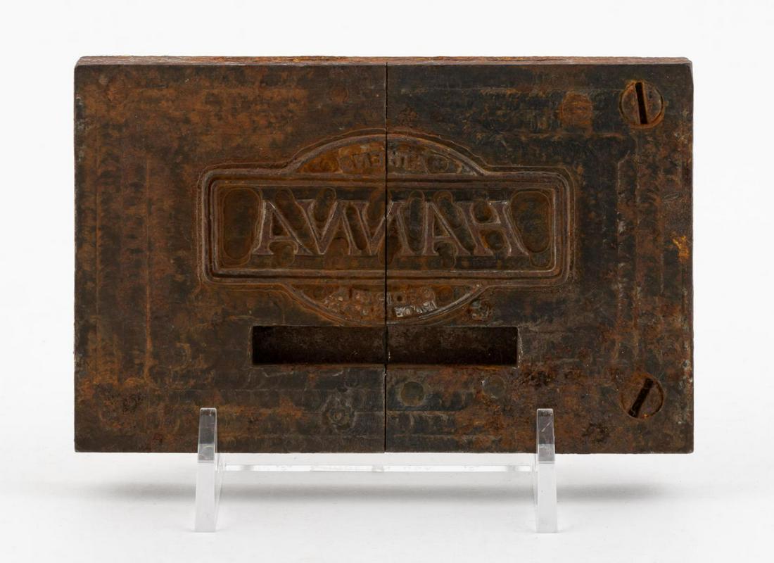 HANNA MANUFACTURING CO. LOGO BAT PLATE: Hanna Manufacturing Company (American), 20th century. Metal stamping logo plate for baseball bats. Marked to front with "Hanna. Athens, Georgia, Made in U.S.A.". Provenance: Found at site of Hanna Man