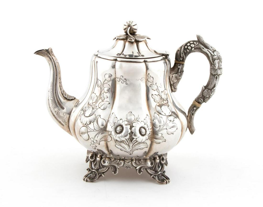 CHARTERS, CANN & DUNN COIN SILVER COFFEE POT: Charters, Cann & Dunn (American, 19th century) for Gregg & Hayden Company (Charleston, 19th century), circa 1850. A very rare and fine American coin silver coffee pot with chased design, melon finial,