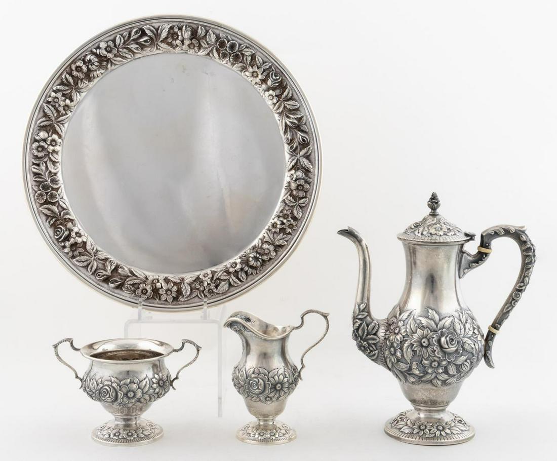 KIRK & SON "REPOUSSE" STERLING COFFEE SERVICE: S. Kirk and Son (American, 20th century). Four piece "Repousse" coffee service comprising coffee pot (h. 9.5"), creamer (h. 5"), sugar (h. 3.75"), and tray (dia. 12.25"). All marked "S. Kirk and Son";