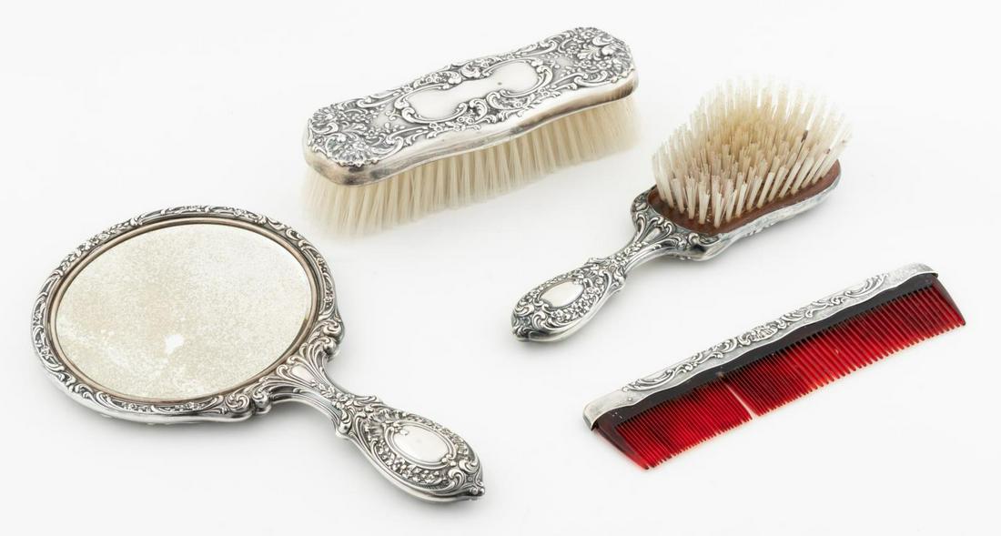 4 PCS, GORHAM "CHANTILLY" STERLING DRESSSER SET: Gorham (American, founded 1831). "Chantilly" pattern dresser set comprising hand mirror, handled brush, brush and comb. Each marked "Gorham Sterling", mirror and handled brush with monogram "JWS"Appro