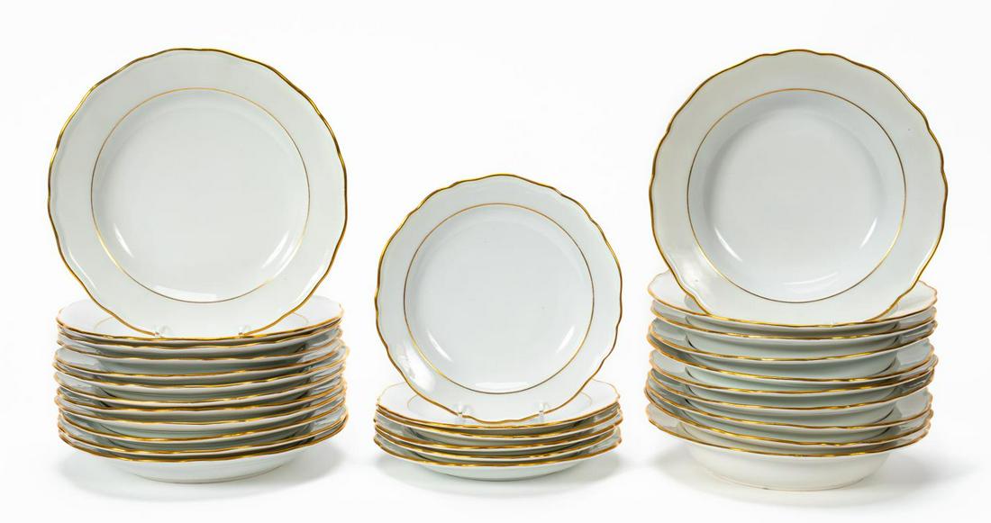 28PC MEISSEN WHITE & GILT PORCELAIN DINNER SET: Meissen. Twenty eight piece white with gilt rim partial porcelain dinner service comprising of six dessert plates (diam. 7.875"), twelve dinner plates (diam. 9.375"), and ten bowls (diam. 9.25"). Mark